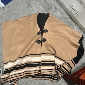 Brand new poncho only worn once